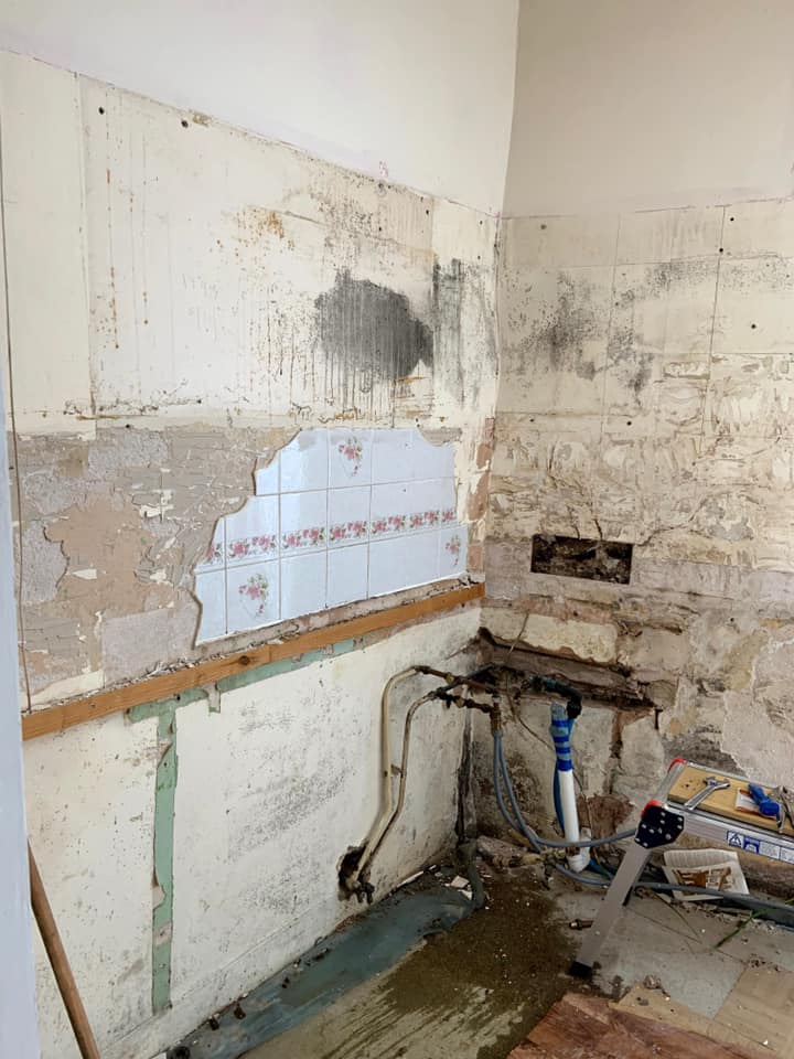 Kitchen water leak remediation and refit : before, during and after