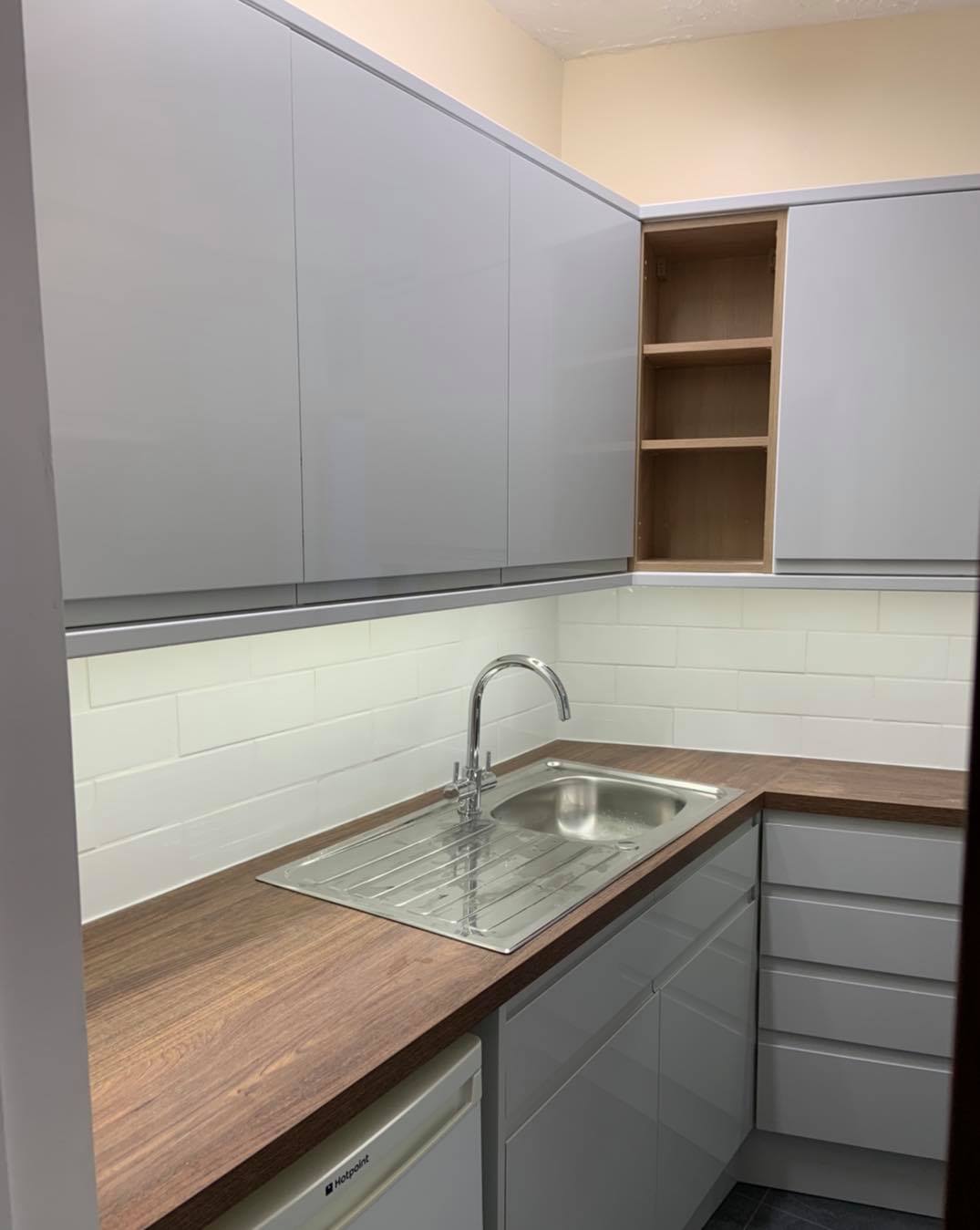 Kitchen water leak remediation and refit : before, during and after