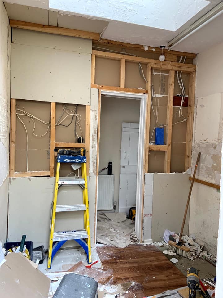 Kitchen water leak remediation and refit : before, during and after